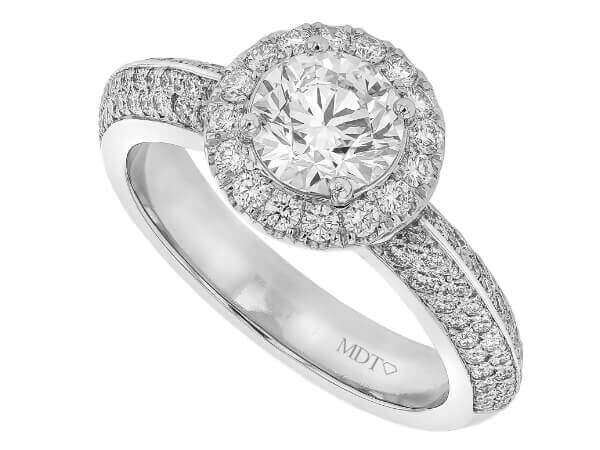 A Round Diamond Halo Engagement Ring with Pave Diamond Band C1072 in white gold.