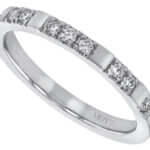 A Spaced Claw Set Diamond Wedding Band in White Gold C991 elegantly adorned with diamonds.