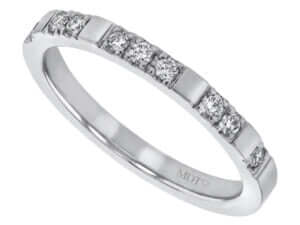A Spaced Claw Set Diamond Wedding Band in White Gold C991 elegantly adorned with diamonds.