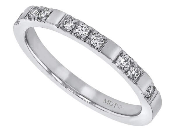 A Spaced Claw Set Diamond Wedding Band in White Gold C991 elegantly adorned with diamonds.