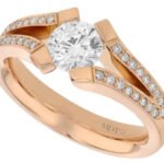 A Split Band Diamond Tension Set Ring C1042 with a split band in rose gold.