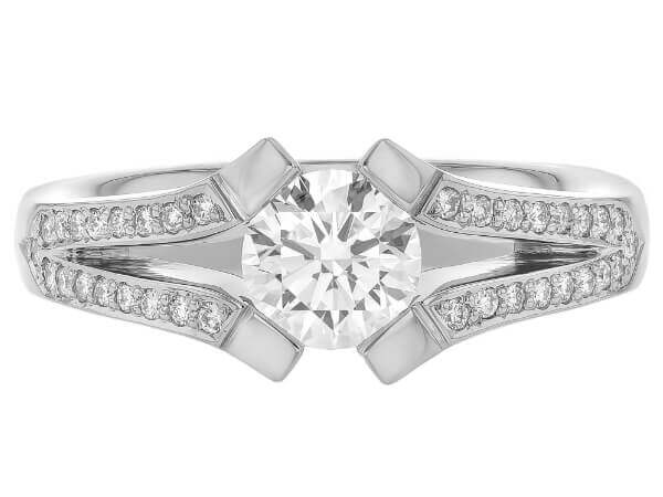 A white gold engagement ring with an oval cut diamond, featuring a split band.