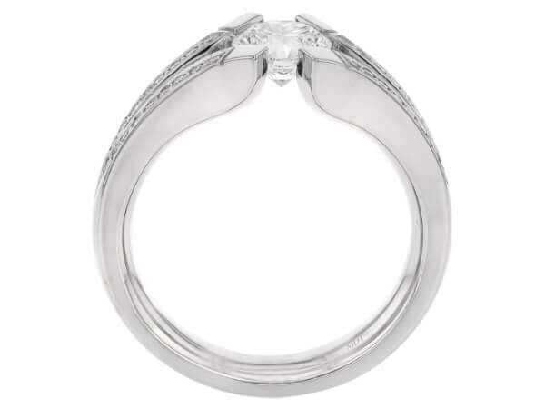A white gold engagement ring with an oval cut diamond, featuring a split band.