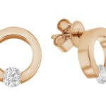 A pair of rose Gold Tension Set Diamond Earrings C1101 with .15ct tension set diamond in the center.