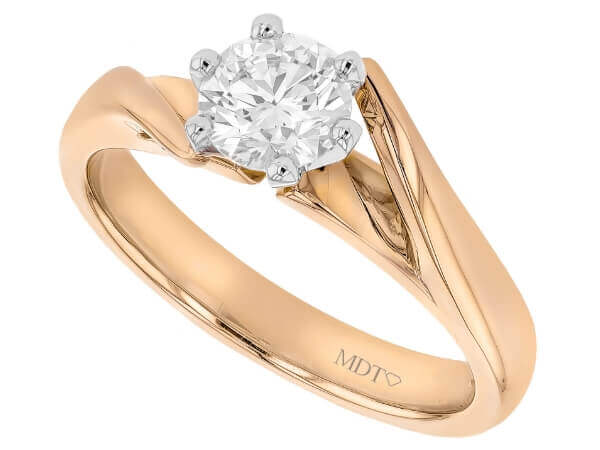 An 18ct rose gold engagement ring with a round cut diamond, the perfect diamond engagement ring option combining elegance and luxury in its twiste band solitaire design.