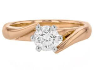 A stunning rose gold engagement ring featuring a solitaire diamond -Top view