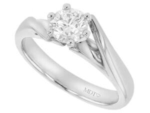 A white gold engagement ring with a solitaire diamond.