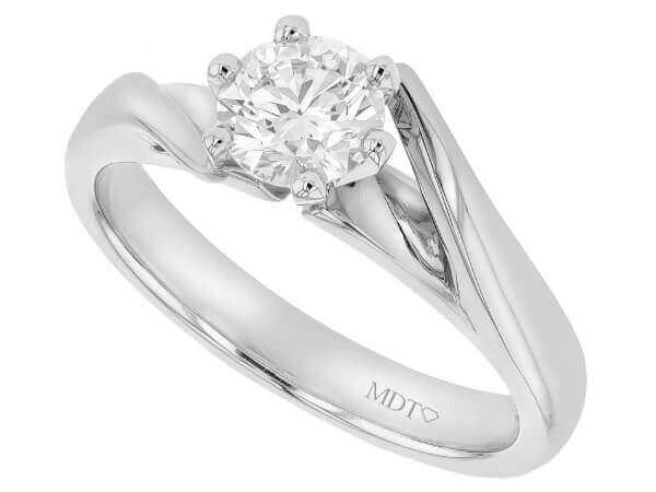 A 18ct white gold engagement ring with a round solitaire diamond.