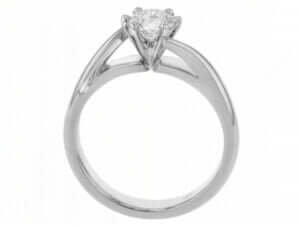 An elegant solitaire diamond engagement ring with a round brilliant cut diamond in white gold -Side view