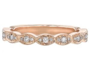 A Women's Grain Set Diamond Wedding Band in Rose Gold C1066 with grain set diamonds in the center.