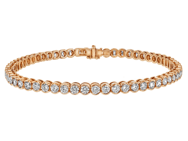 half bezel set diamond tennis bracelet in 18ct rose c609