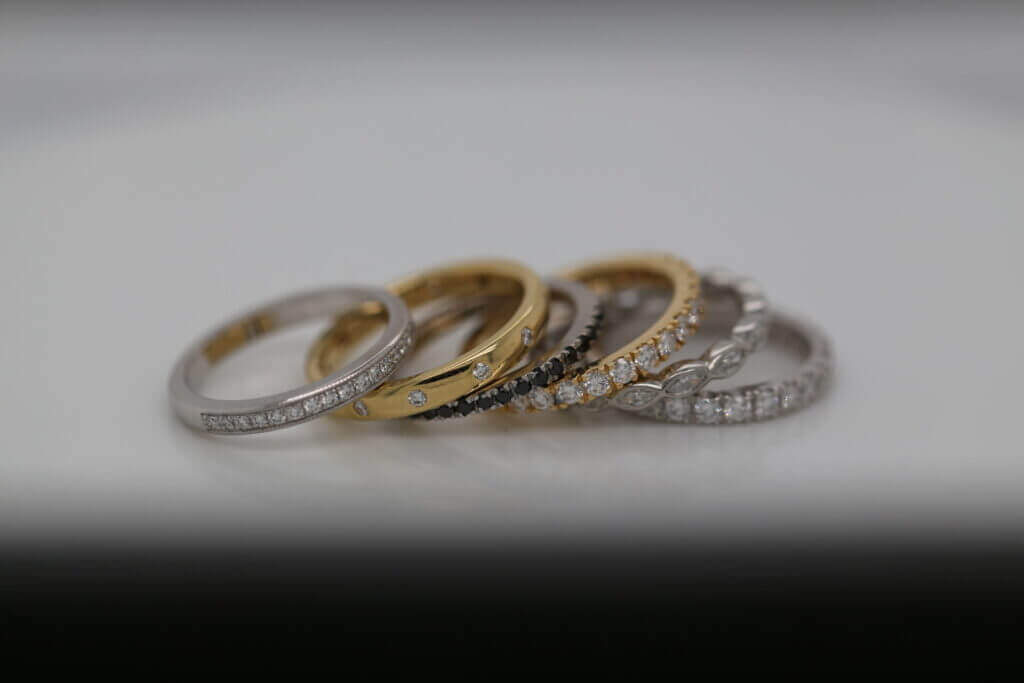 wedding bands stack, featuring a range of handmade diamond wedding bands