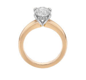 A rose gold ring with a large, white oval diamond solitaire setting, with a diamond hidden halo of the side of the setting perfect for those seeking unique engagement rings.
