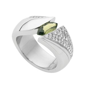 A white gold tension set ring with a green sapphire in the centre and diamonds set into the side of the a symmetric band.