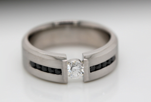 Mens Diamond Wedding Ring with White Diamond in the centre and Black Diamonds channel set into the band