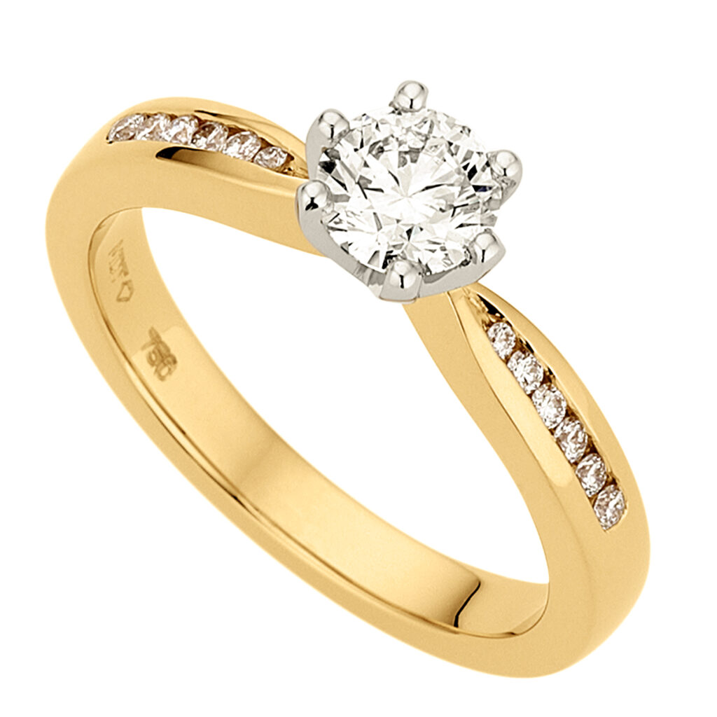 Round Diamond With Channel Set Shoulders in Yellow Gold
