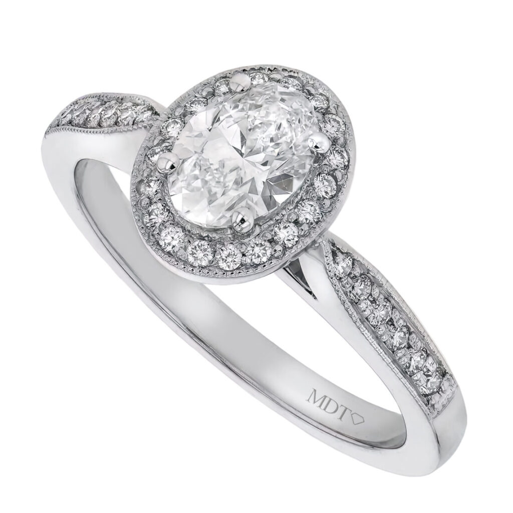 Oval Grain Set Halo Diamond Ring in Platinum C1018