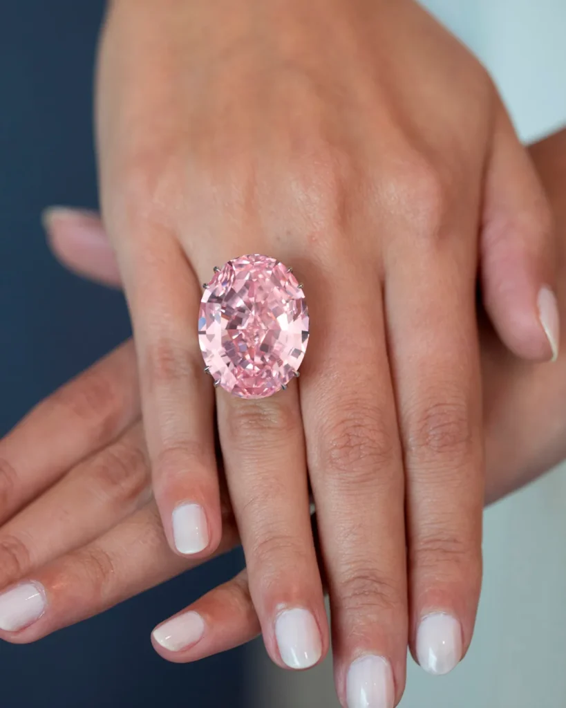 PINK STAR DIAMOND rare expensive and sizable, sat on someones hand.
