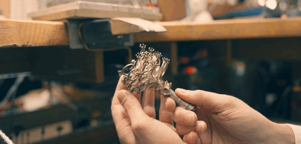 Casting tree with multiple ring settings, used in the handcrafting process before polishing and finishing in a jewellery workshop.