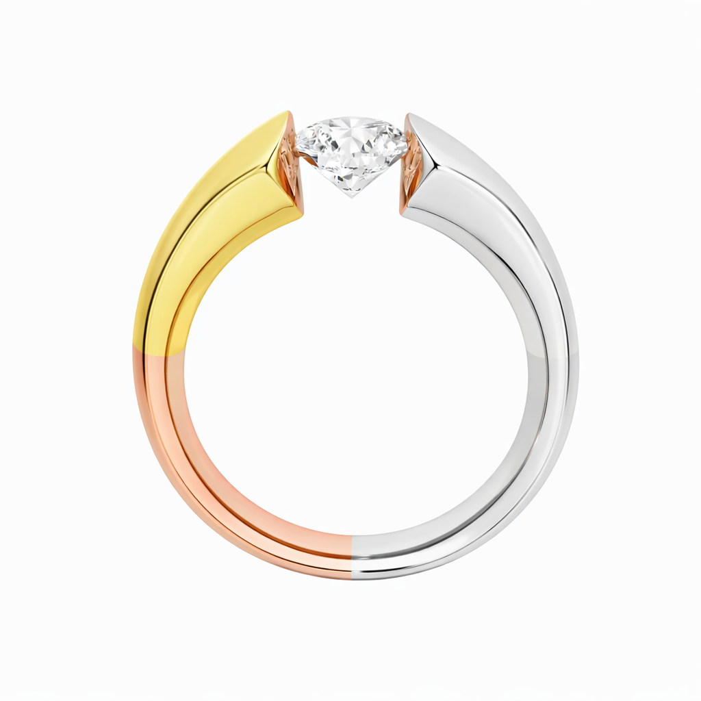 Tricolour tension-set engagement ring featuring a round brilliant cut diamond suspended between three distinct metal sections in yellow gold, rose gold and white gold, handcrafted in a sculptural MDT DESIGN style.