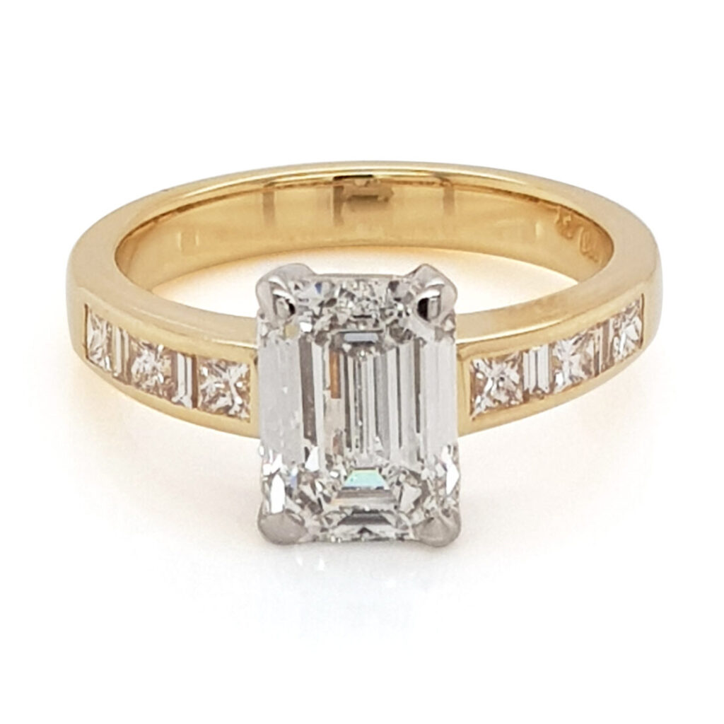 Custom Emerald Cut Diamond Engagement Ring with Channel Set Shoulders