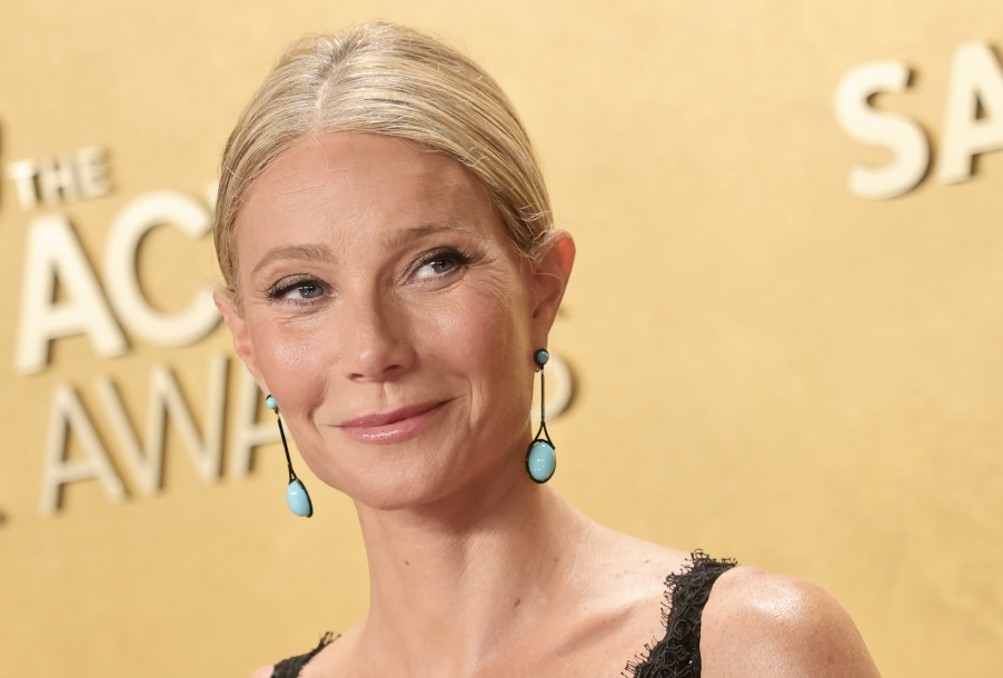 Close Up of Gwyneth Paltrow wearing turquoise cabochon drop earrings with black plated metal at the Actor Awards.