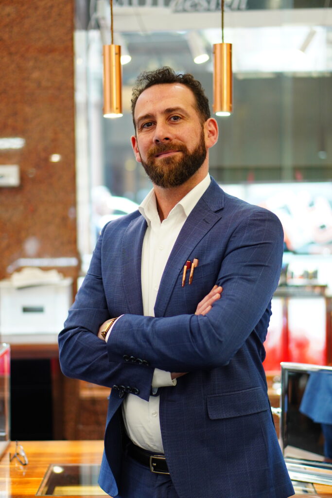 Kosta Theochari of MDT DESIGN in the Melbourne boutique, reflecting on his journey as a jeweller, award-winning designer and second-generation member of the family business.
