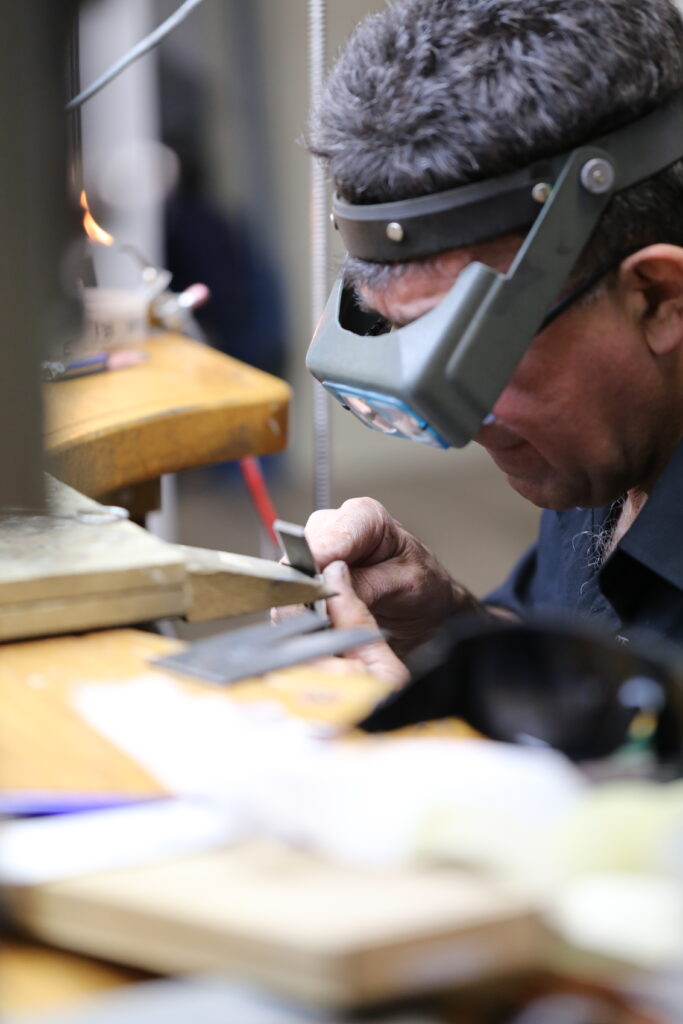 Nicholas Theochari working at the jewellery bench