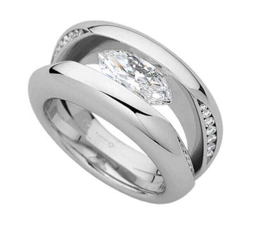 Marquessa 18ct white gold ring by Nicholas Theochari, featuring a tension-set 1ct marquise diamond and diamond-set split shoulders.